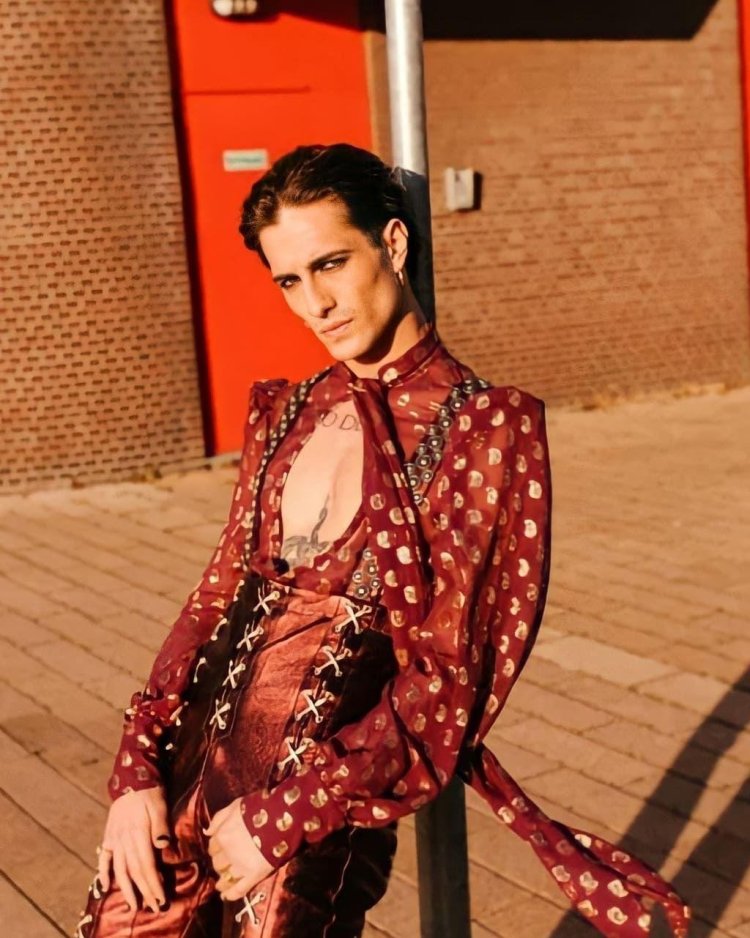 Maneskin in red overalls