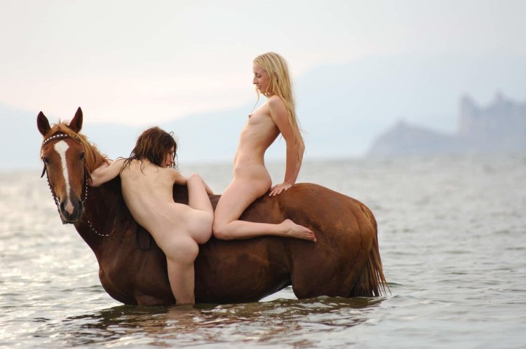 Girls naked on horses