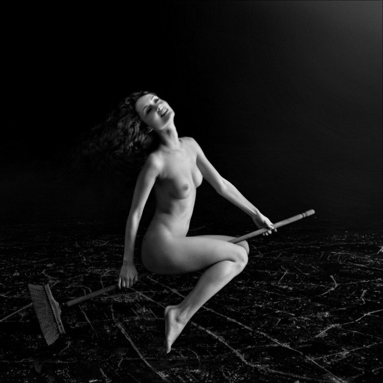 Woman on a broom naked