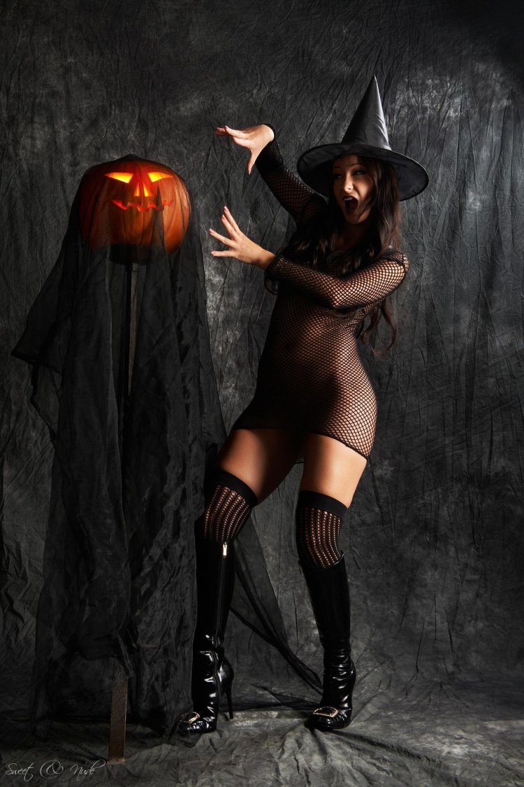 Naked witches in costumes