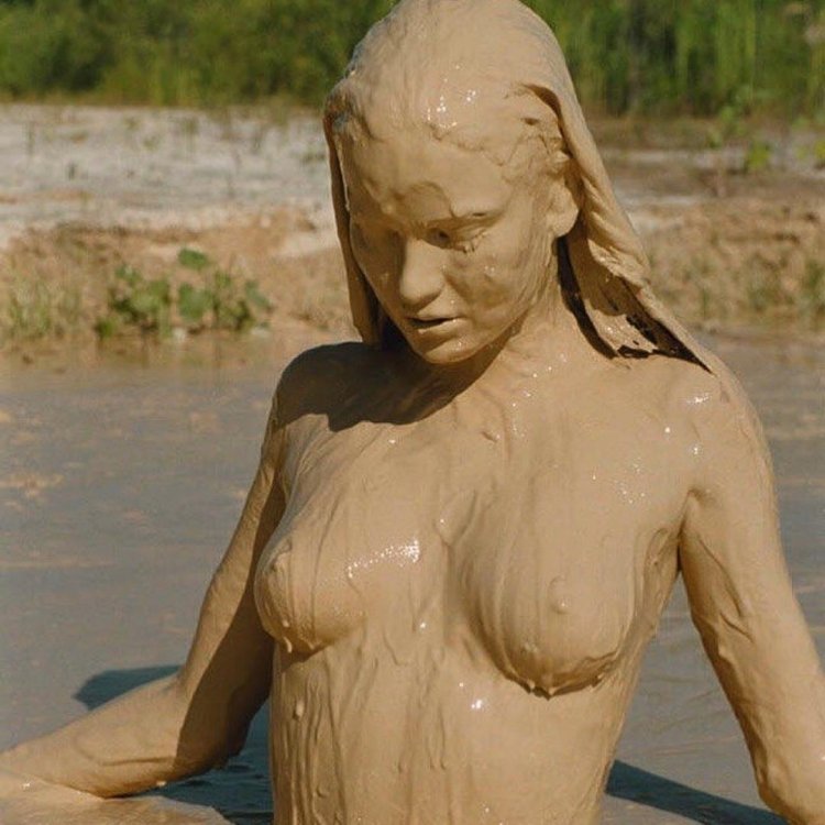 A photo shoot of naked in clay