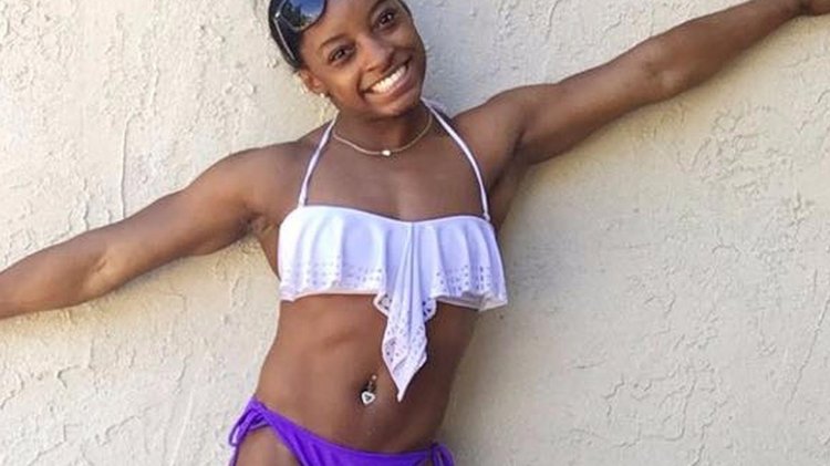 Simona Biles in a swimsuit