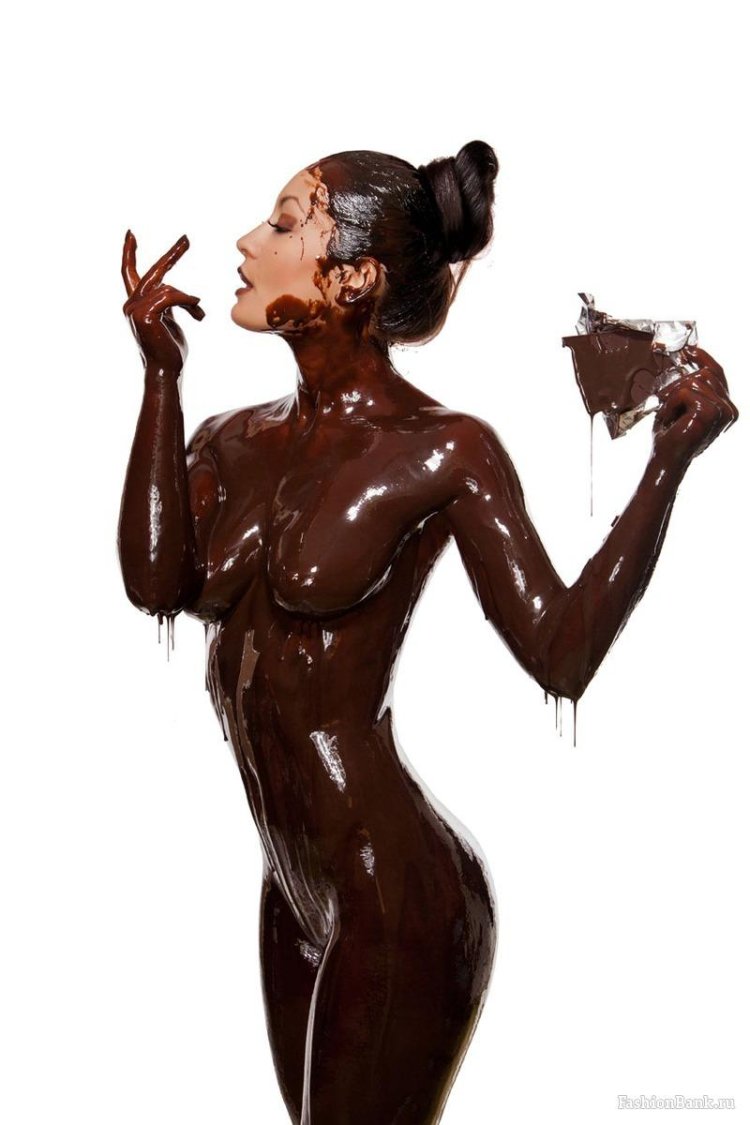 Girl drenched in chocolate