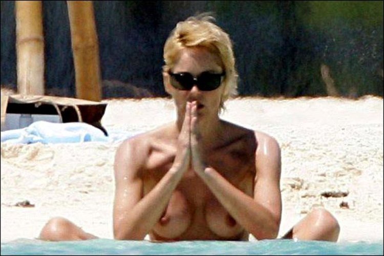 Sharon Stone sunbathing topless