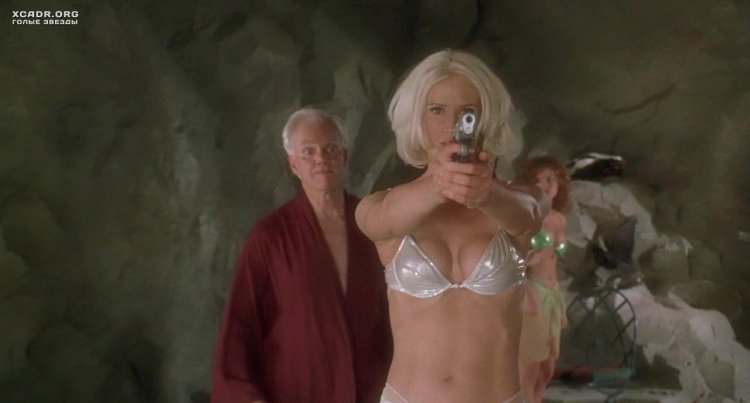 Kelly Lynch in swimsuit