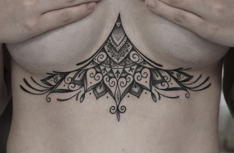 Tattoo Trab between the chest
