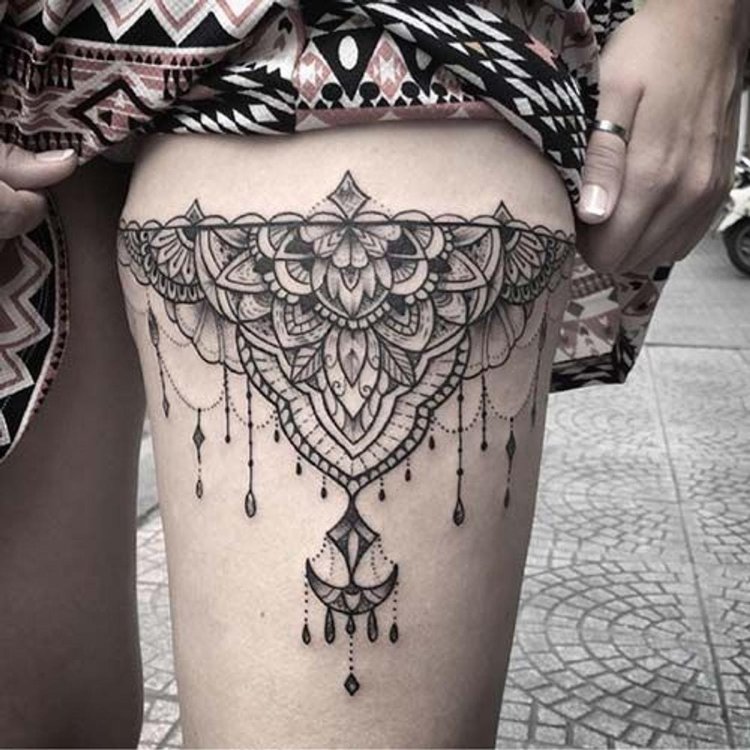 Tattoo mandala on the hip
