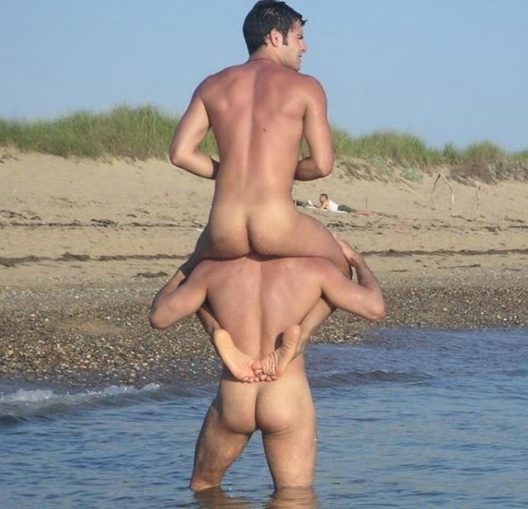 Beautiful naked men on the beach