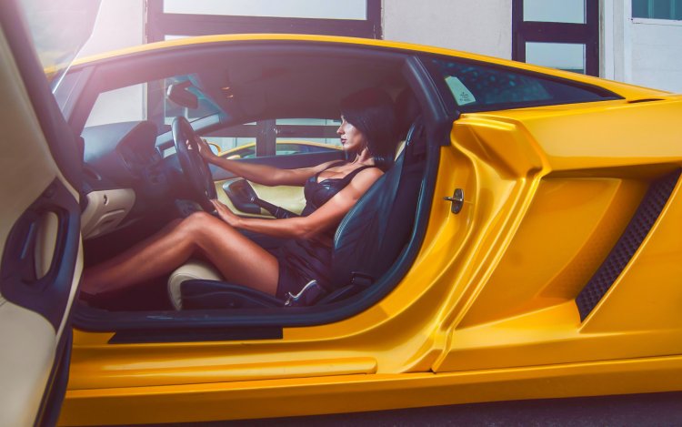 Girl behind the wheel of Lamborghini