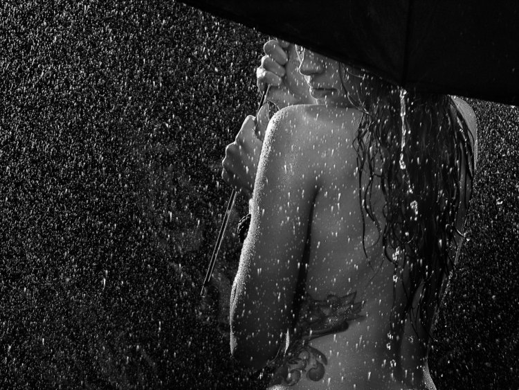 The girl is in the rain