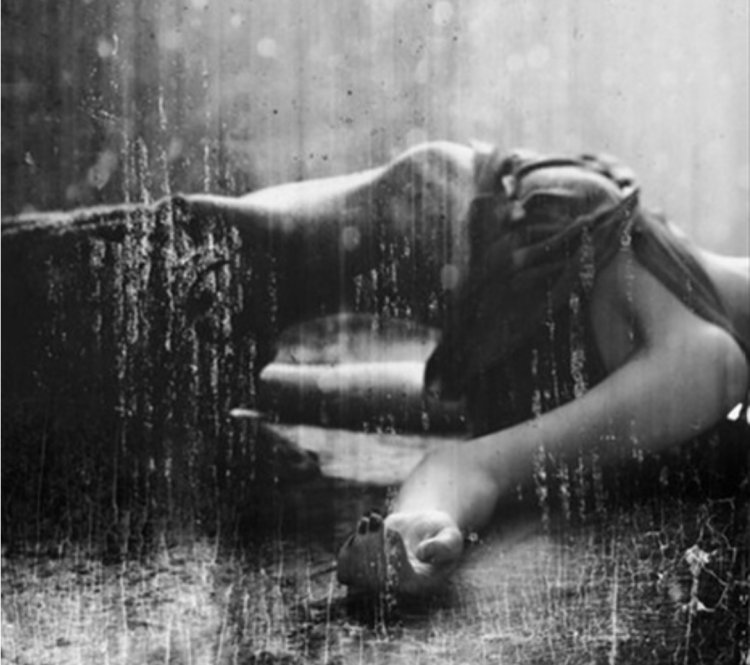 Crying girl in the rain