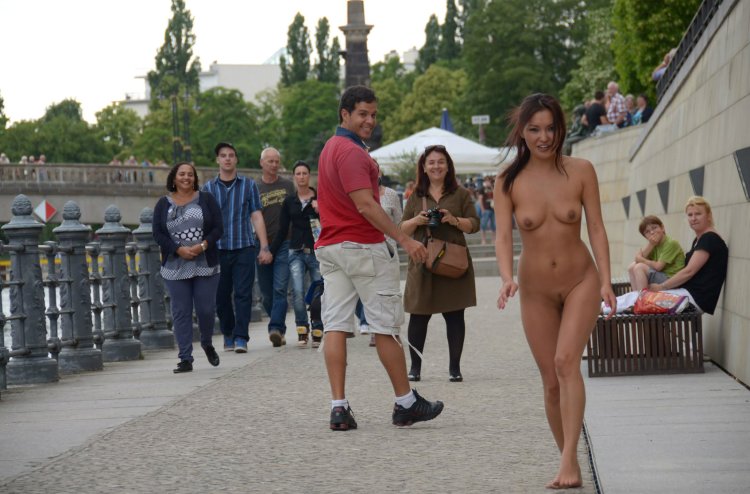 Asian women walk naked around the city