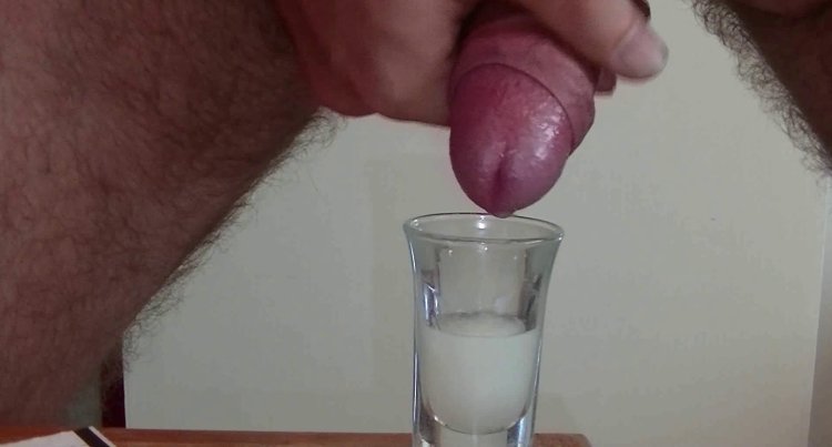 The man cums in a glass