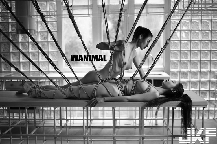 Nude naked on a metal bed