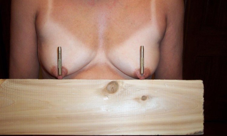 Piercing the chest with nails