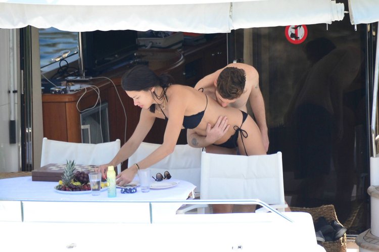 Adrian Lima and Metin Hara on a yacht