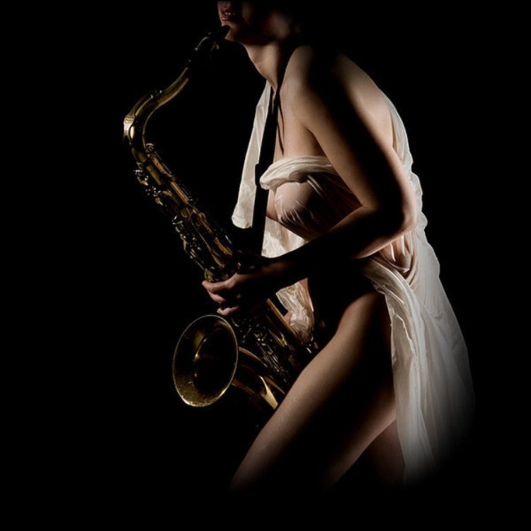 Naked woman with saxophone
