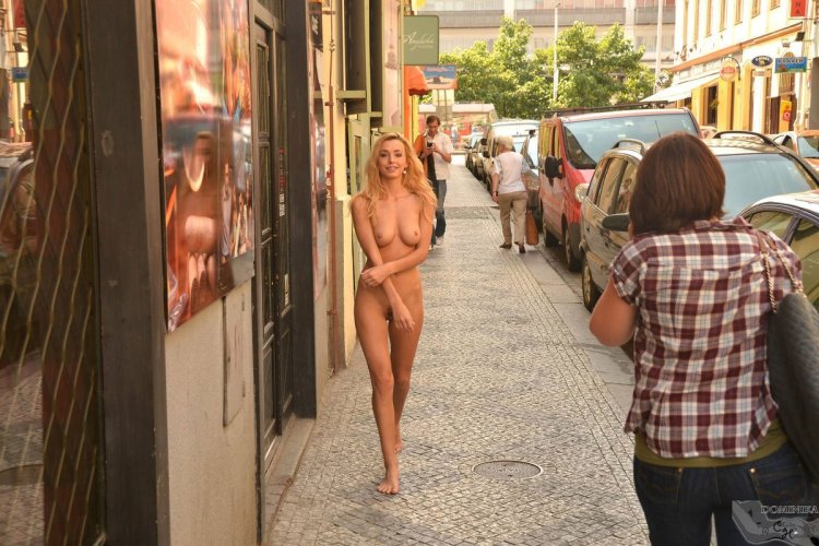 Naked women walk around the city