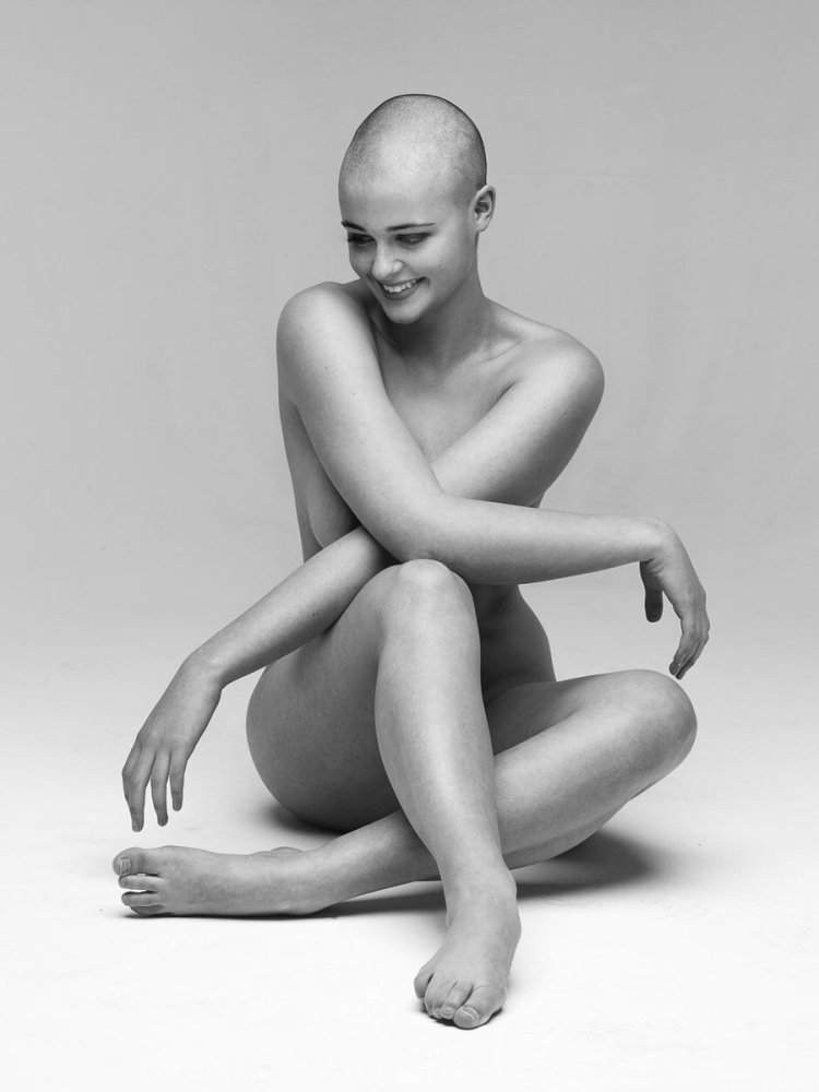 Naked with a shaved head
