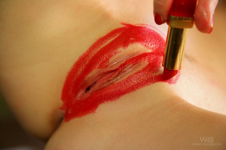 Laps painted with lipstick
