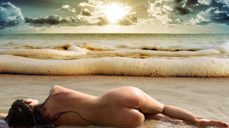 Beautiful naked women at the sea