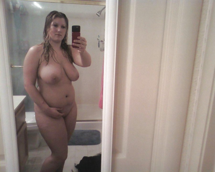 Naked fatty at the mirror
