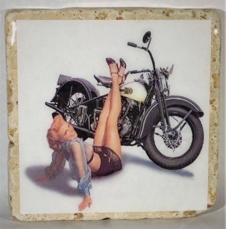 Naked beauty on a motorcycle