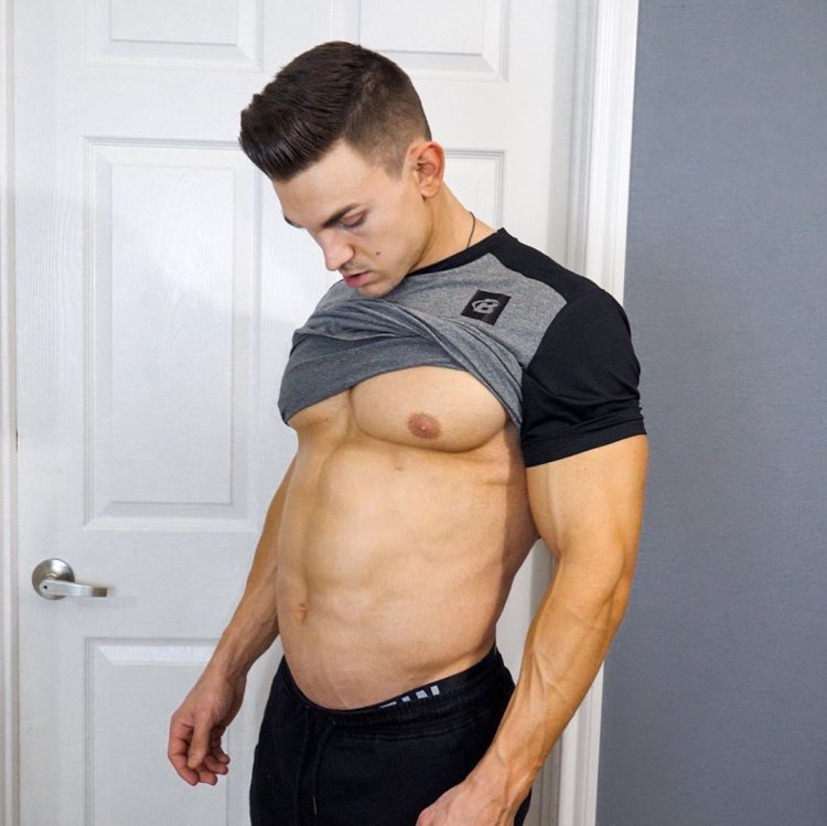 The guys undress in front of the mirror