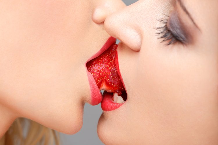 Guy girl and strawberries