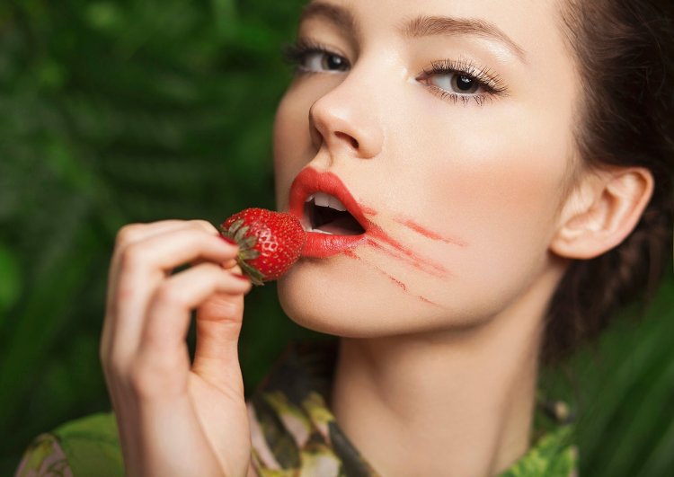 Girl with strawberries