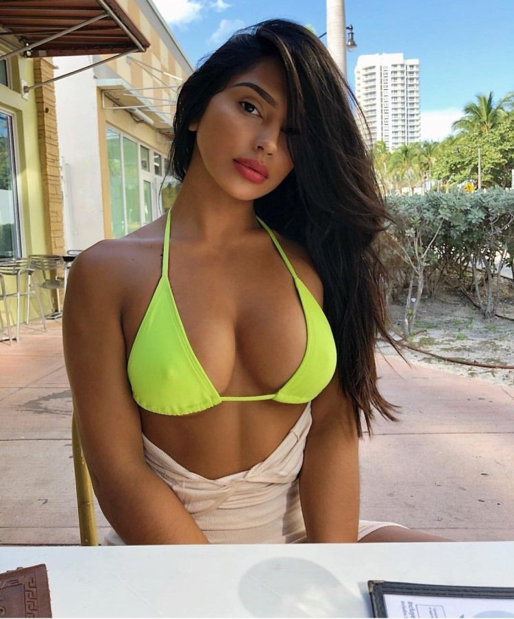 Janet Guzman photo with a square