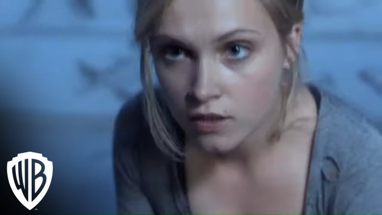 Eliza Taylor-Kotter in a swimsuit