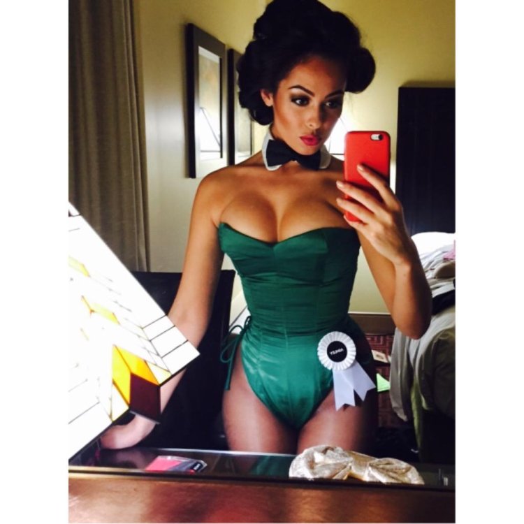 Playbo Ashley Doris in tights in a suit