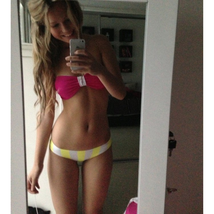 Selfie in front of the Ski mirror young blonde