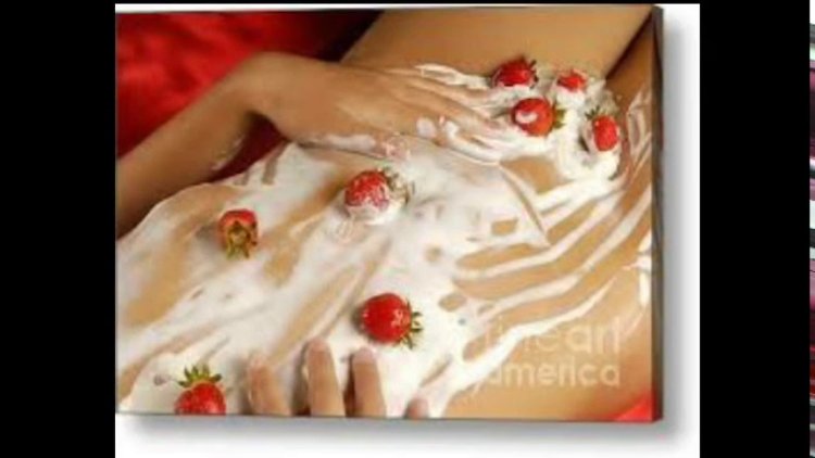 Girl in cream with strawberries