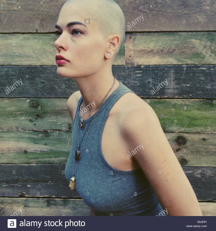 Bald girl on the beach