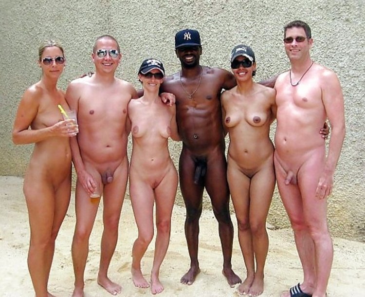 Naked men dressed women on the beach