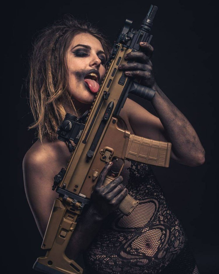 Natalia Airsoft with a gun