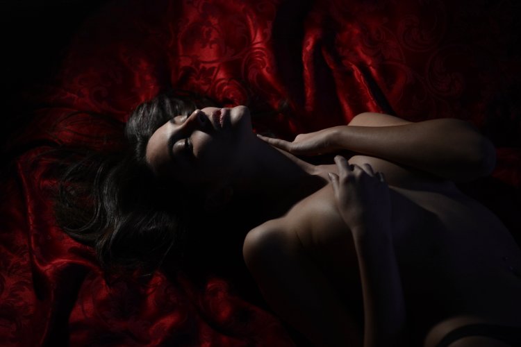 Sensual woman of darkness