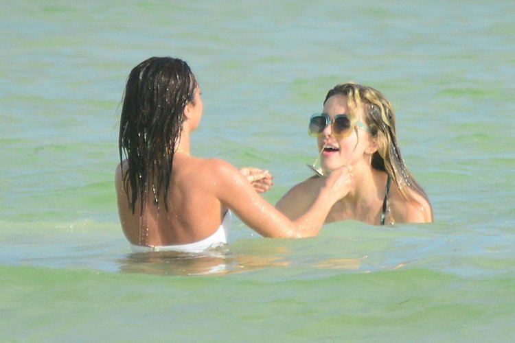 Sarah Heyland in a swimsuit