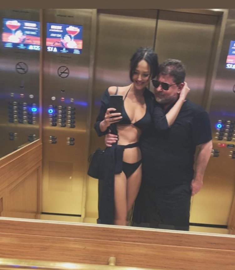 Alexander Tsekalo and Darina Erwin in the elevator