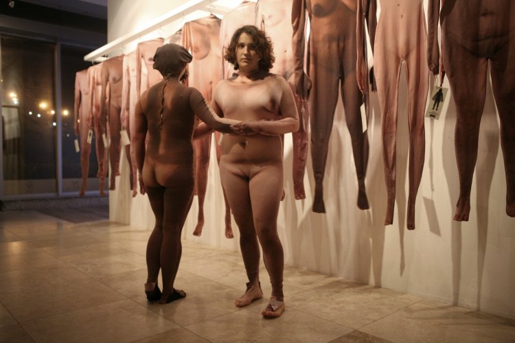 Transes undress on stage