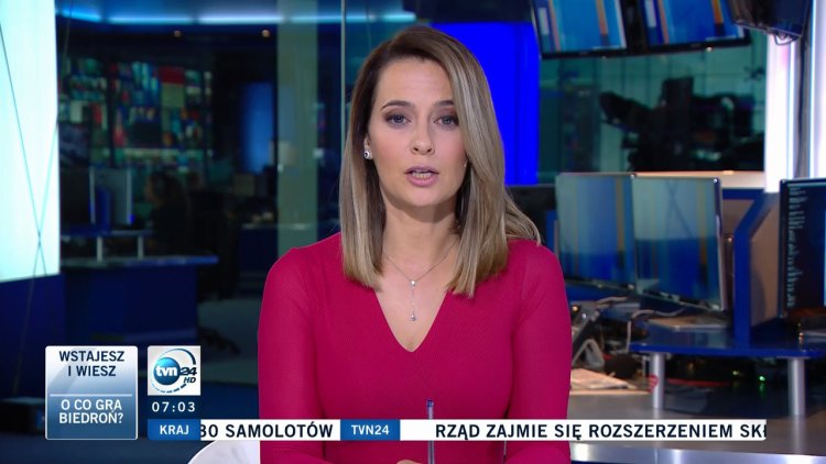 Girl with long blond hair in a skirt